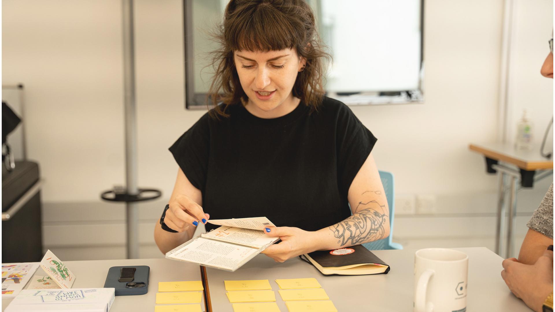 Artist Ål Nik facilitating a game session