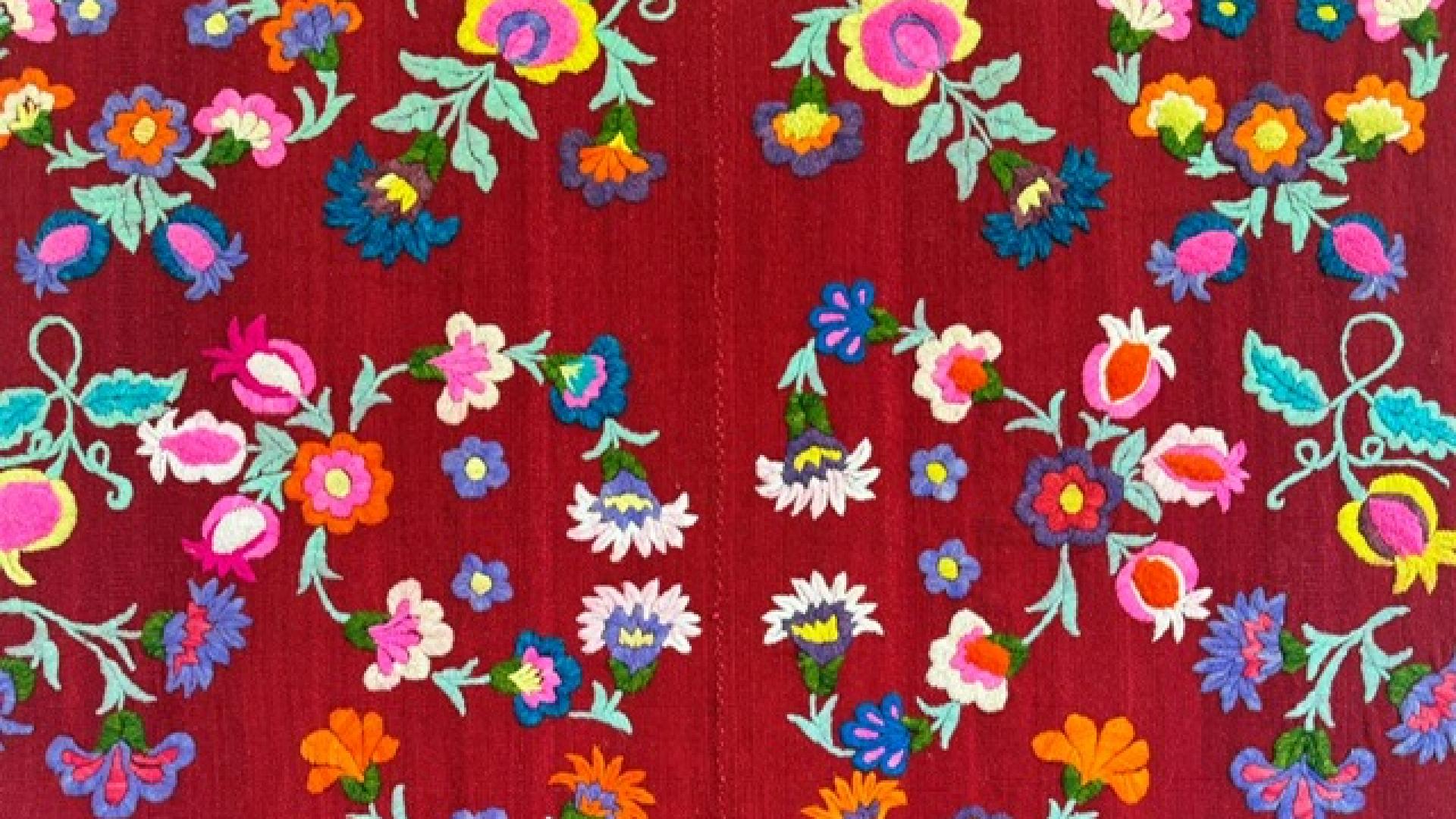 Hand-embroidered blanket by Andean artisans