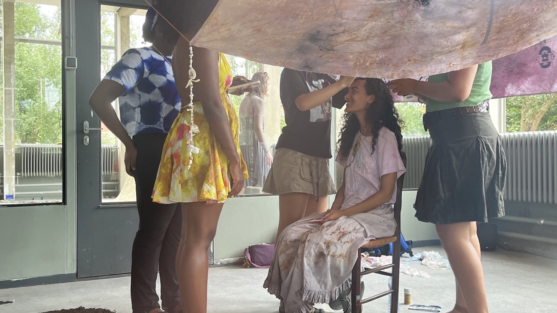Hairstyling performance inside the installation