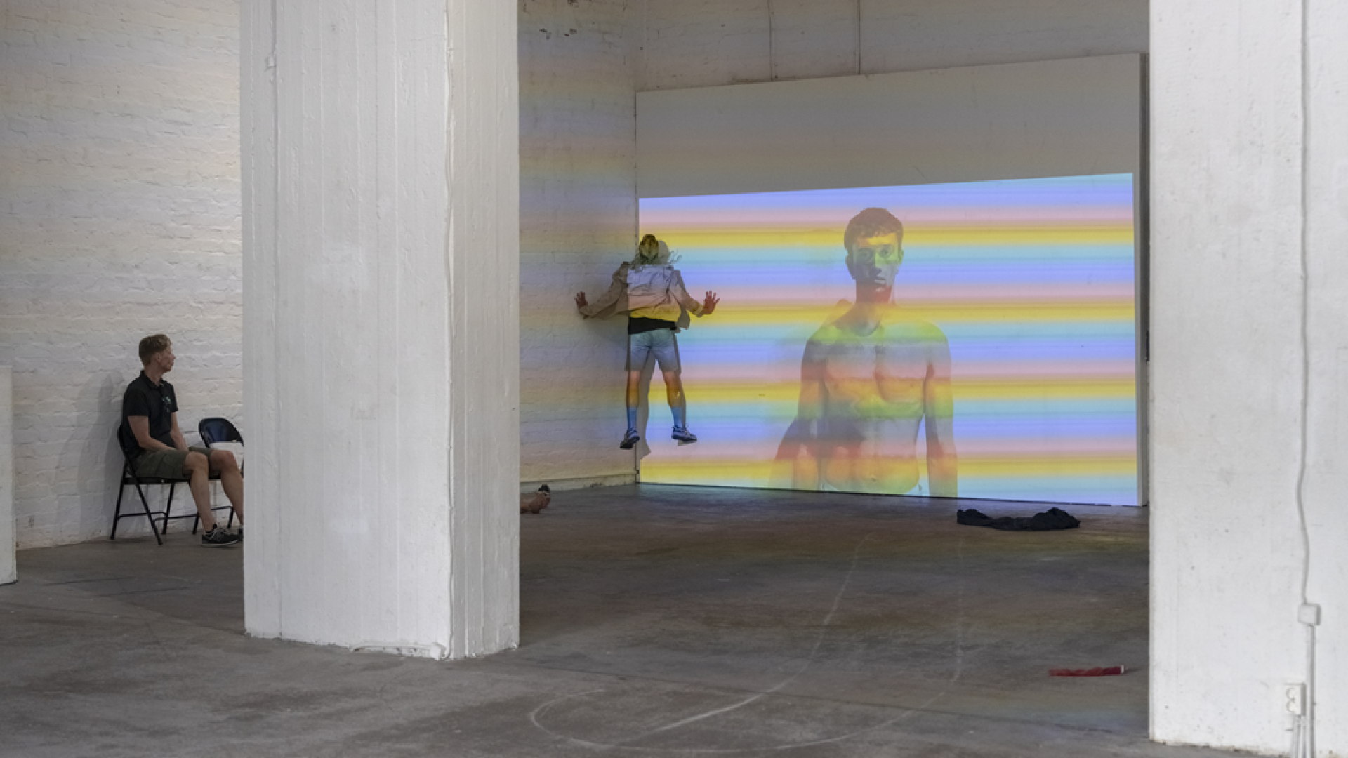 One artist climbing to the corner with big screen
