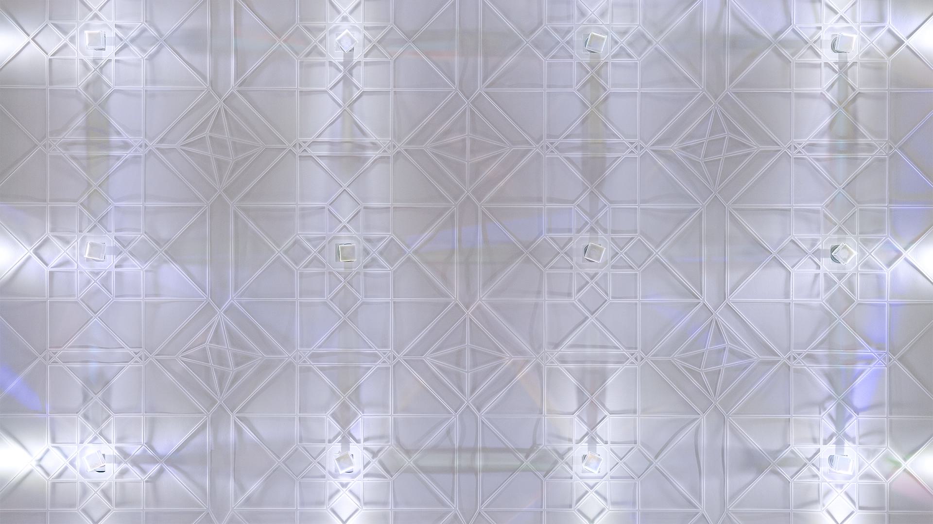 Lightwall — illuminated hand-cut paper pattern