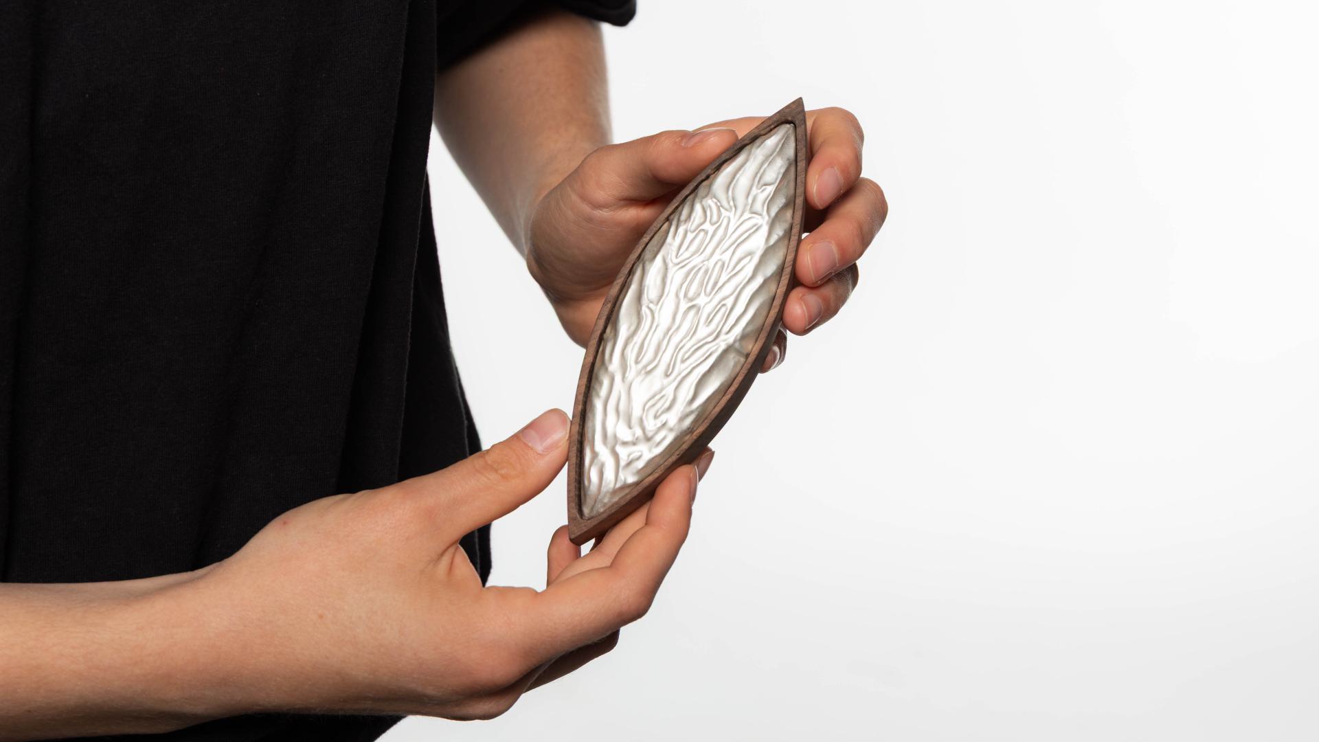 Brooch "Floating", walnut, fine silver