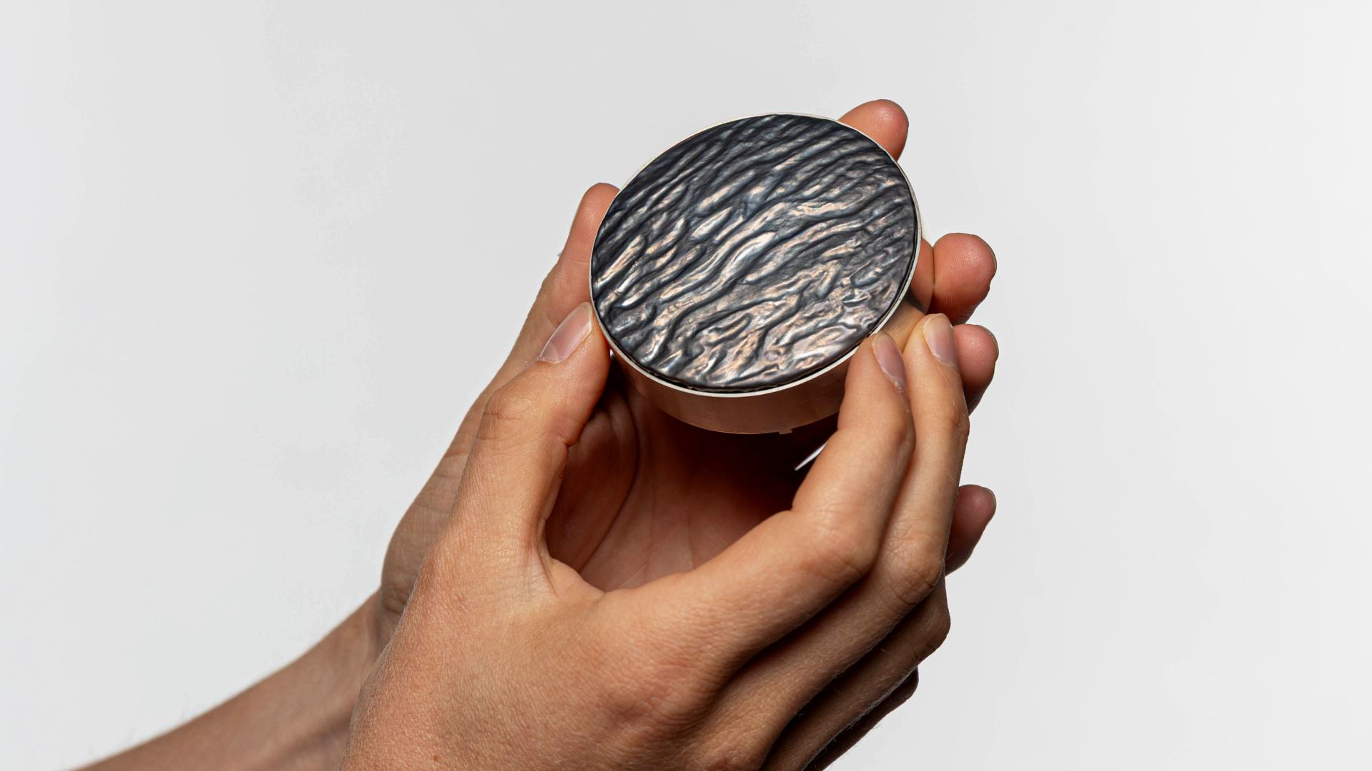 Brooch "Drifting", silver, oxidized fine silver.