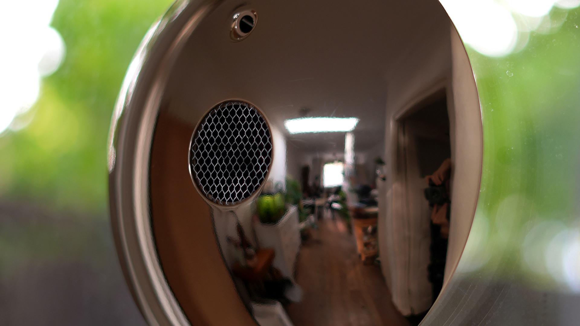 Chimes sound through a speaker at the front