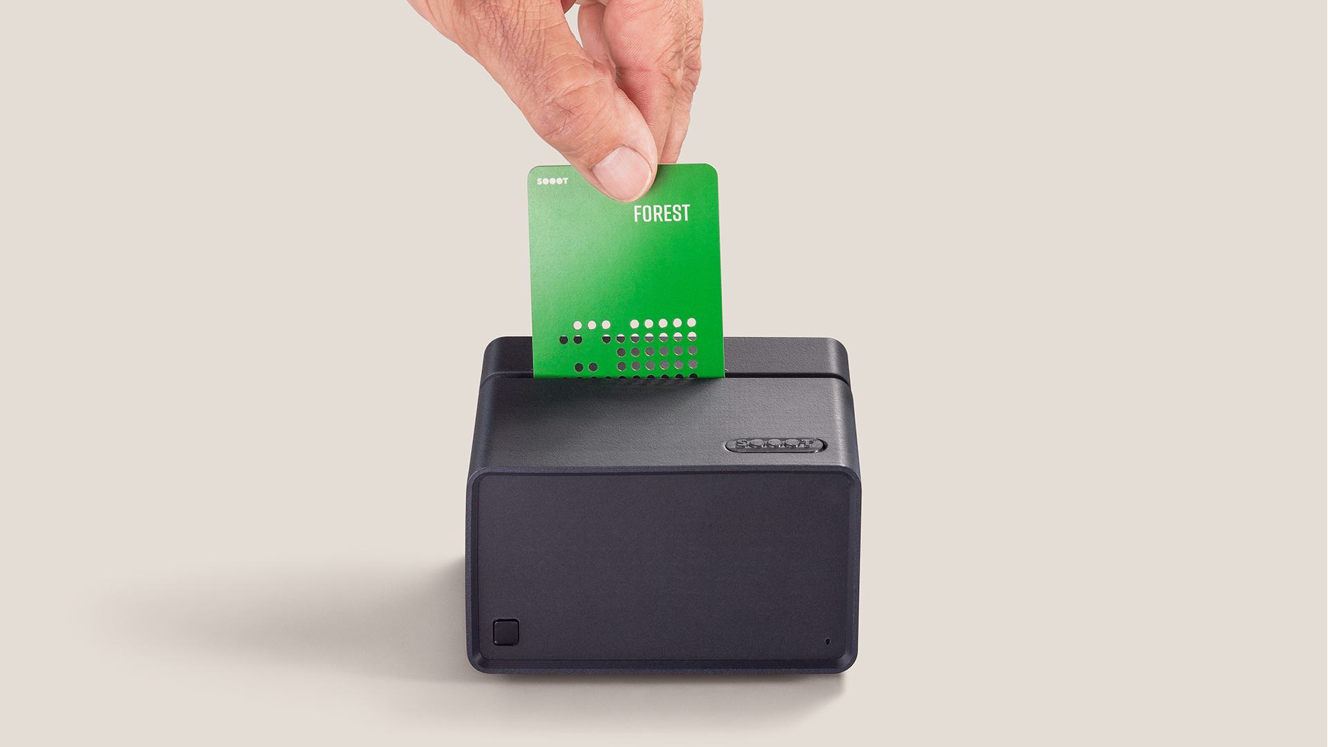 Slide a SOOOT Card in to start. Pull it to stop.