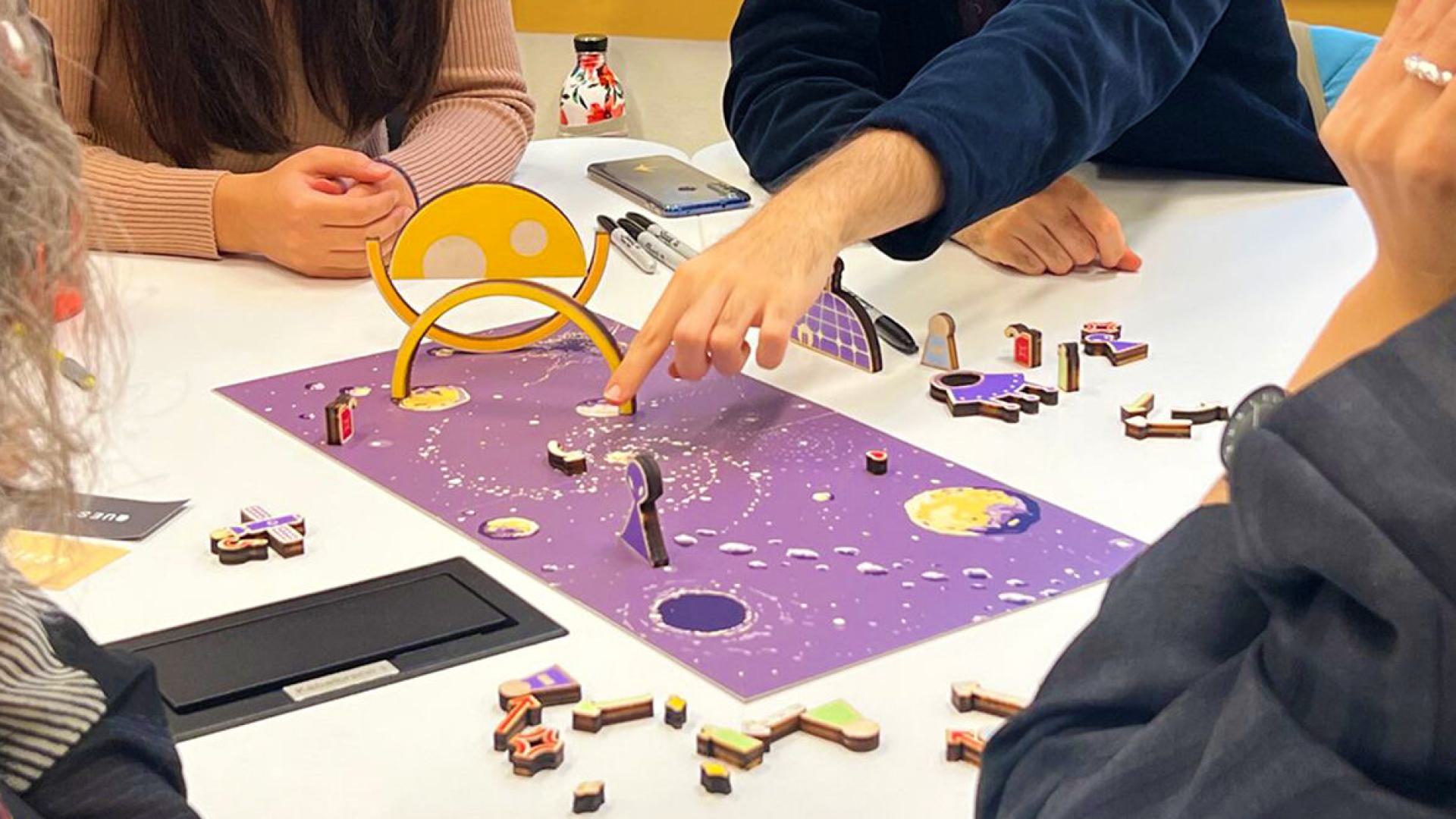 A group playing UNBOX