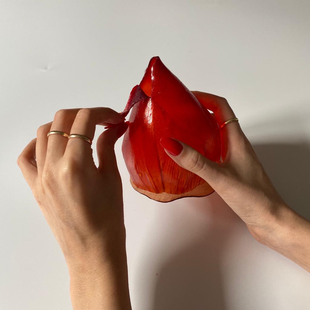 liquid holder with peal-able tip, allows sipping