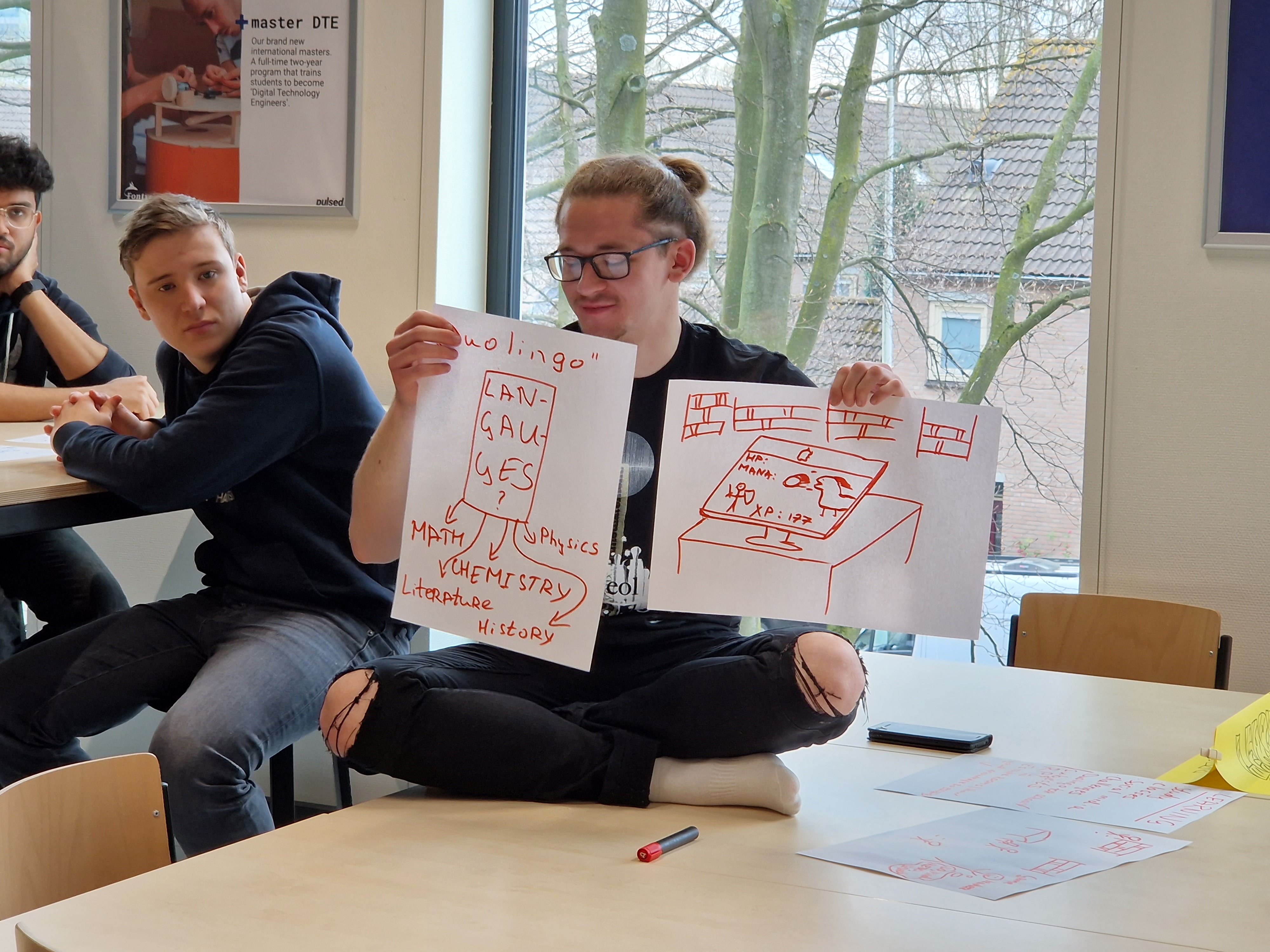 Students cocreating on new concepts future library