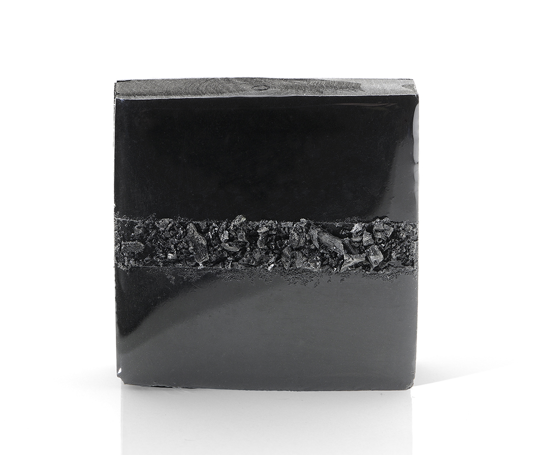 Flood Brooch, Charcoal, resin, silver