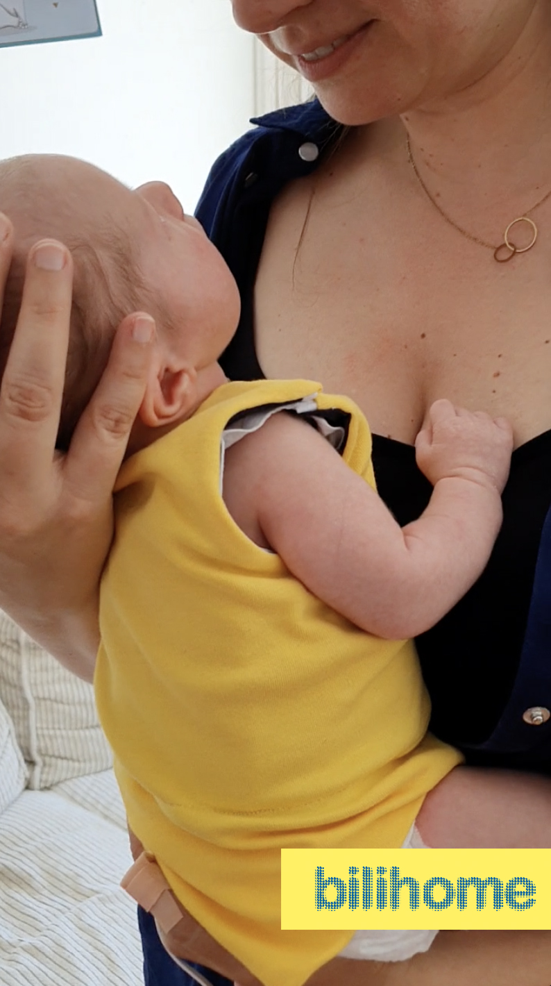 mum bonding with the newborn, while doing therapy