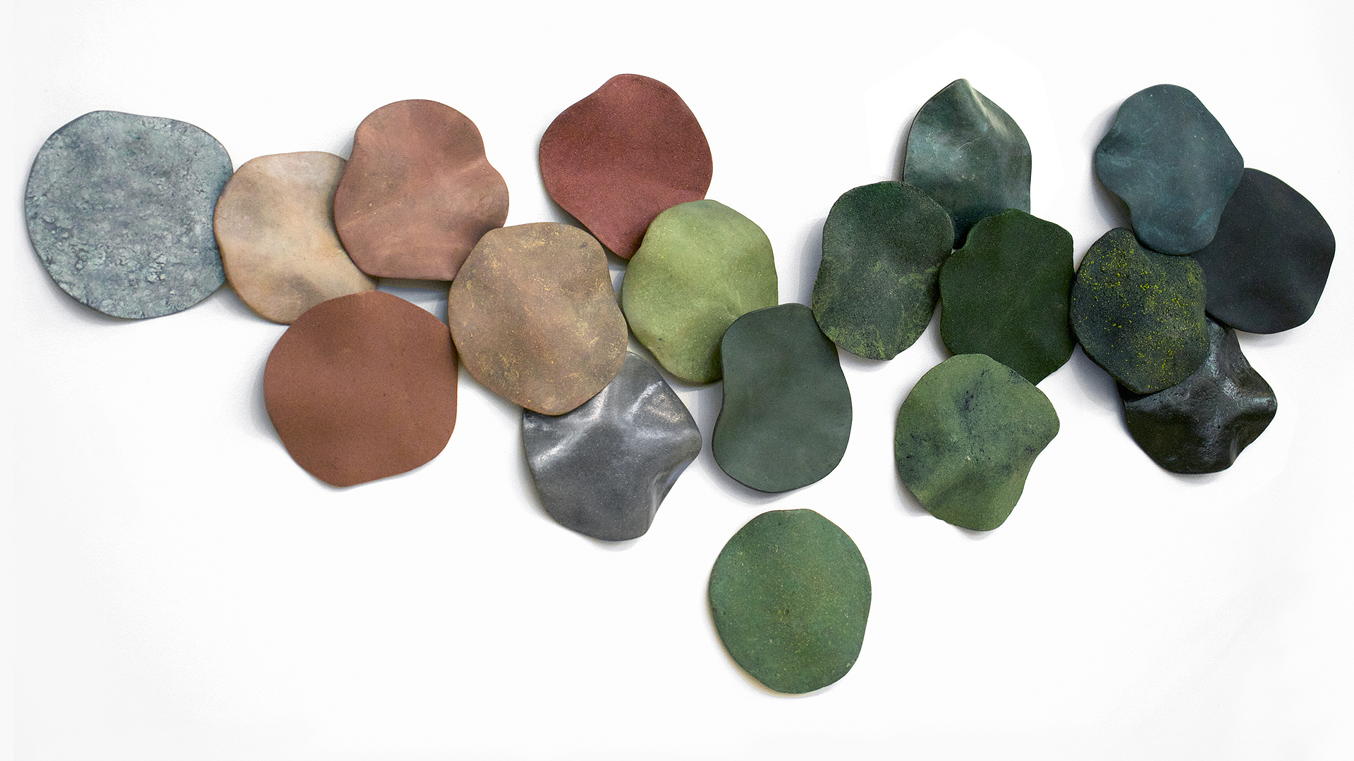 Pigmented, coated samples of Biophilica material 