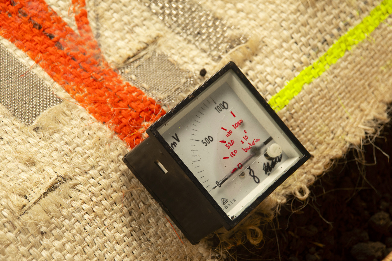 A close-up view of the modified voltmeter