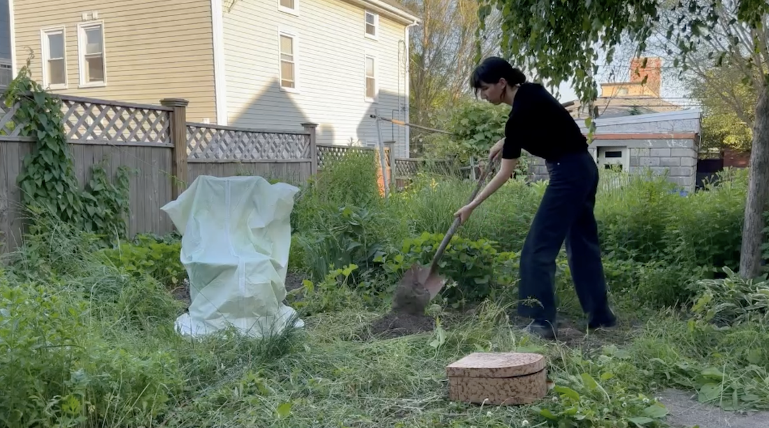 Sarah Alix burying her old, wooden chair