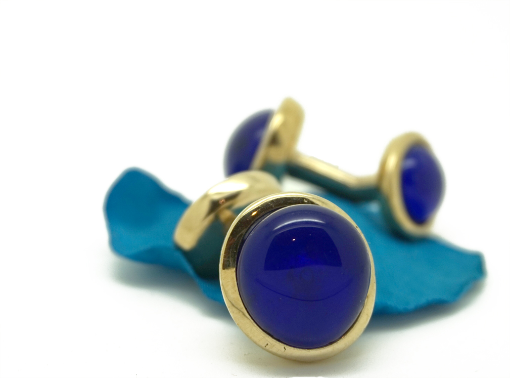 Gold cufflinks with blue glass stones