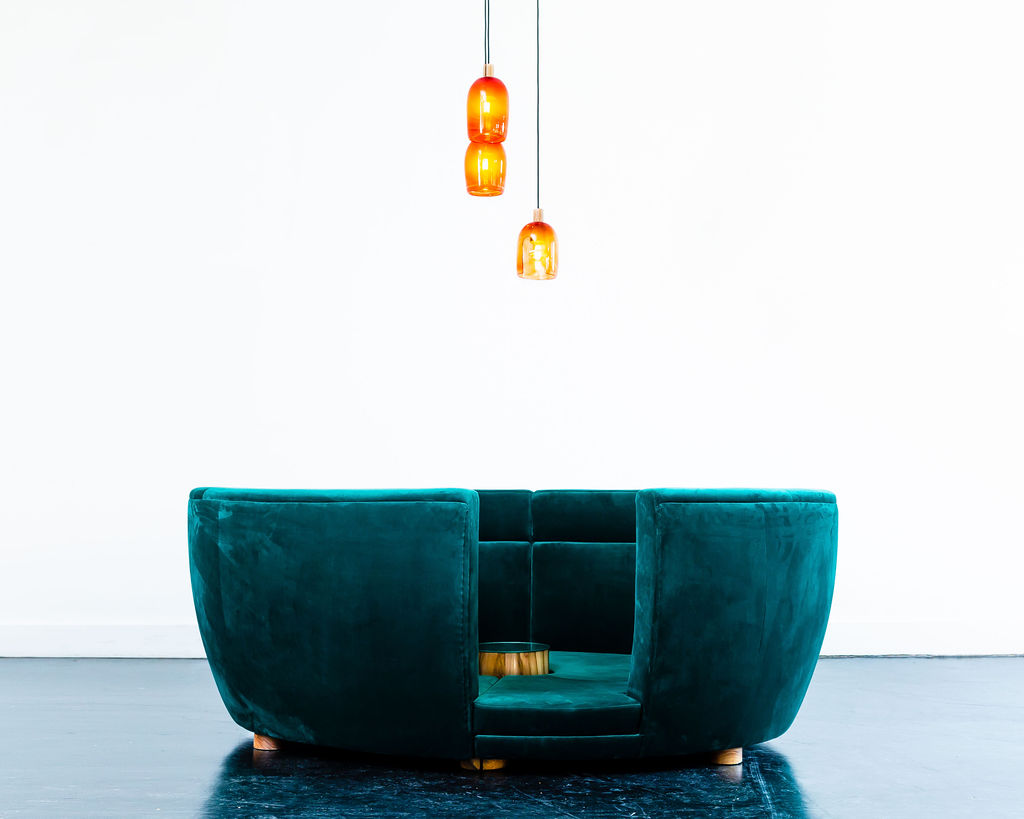 The composition of the sofa and the lamp