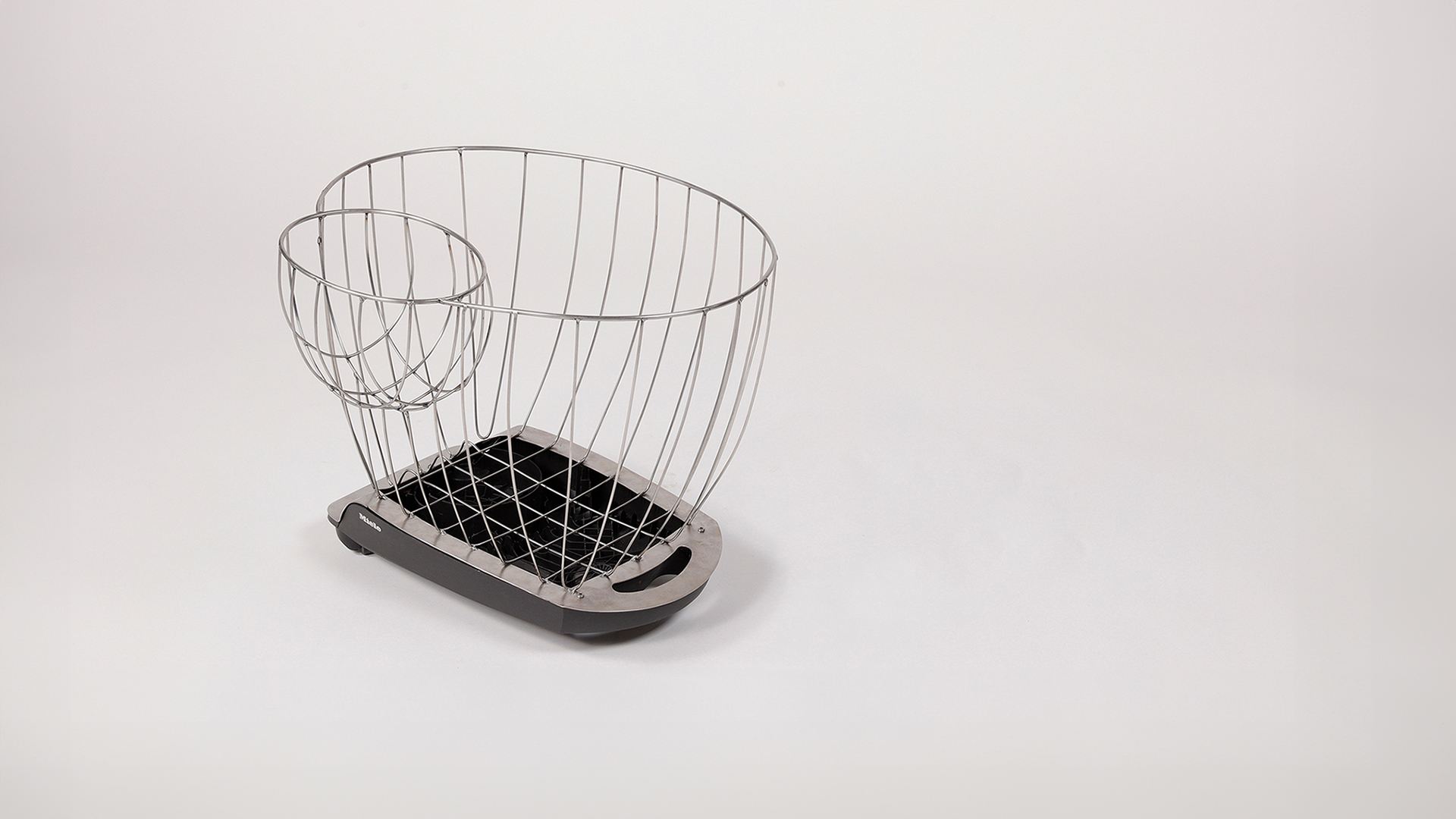 Vacuum cleaner base and stainless steel