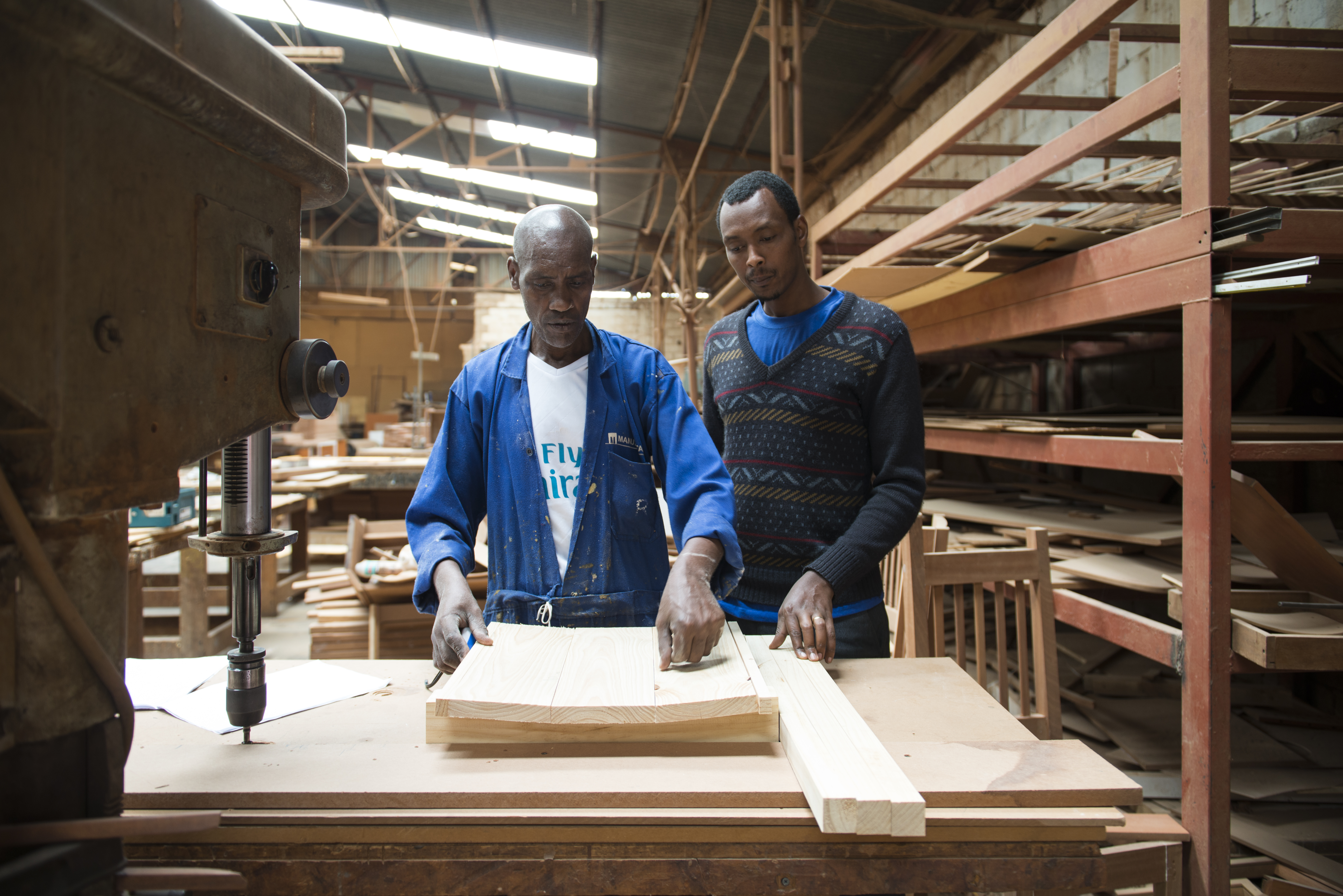 The seat of the chair made by a local carpenter - Manumetal - Kigali, Rwanda