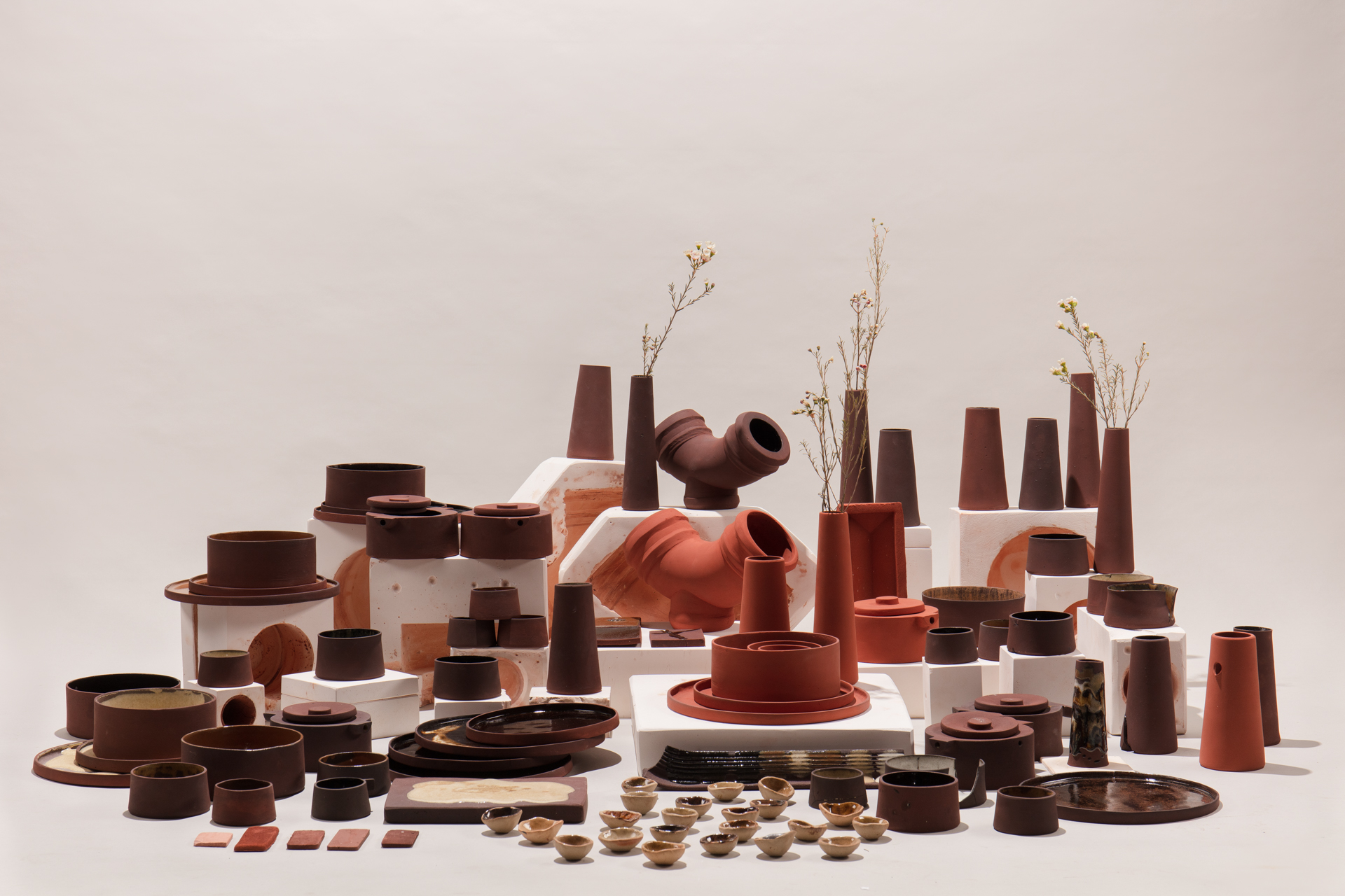 Red mud ceramic set intended to spark imagination