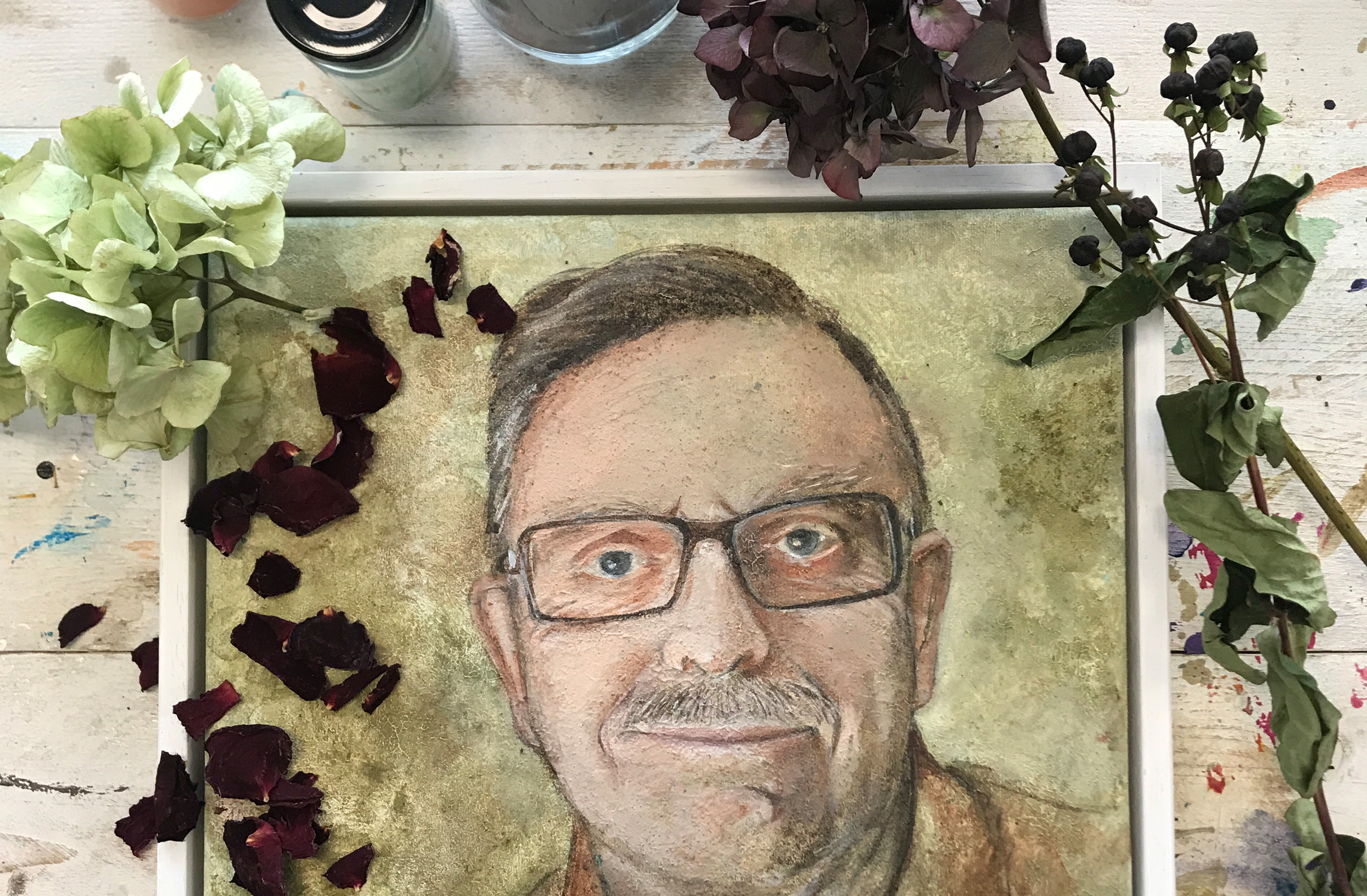 Portrait made from funeral flowers