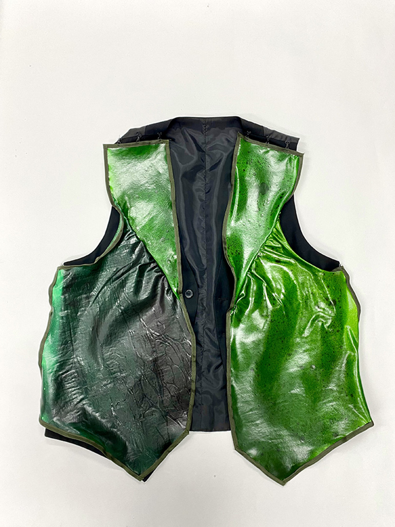 Upcycled gilet with bio plastic details
