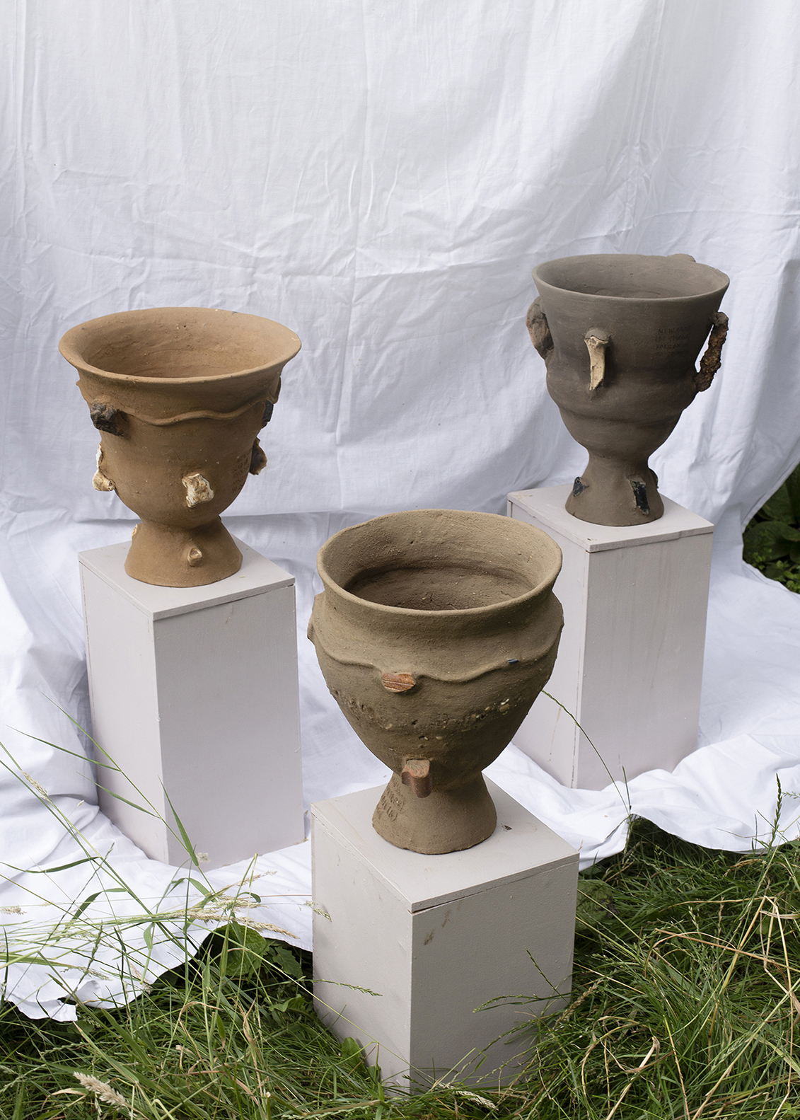 Unfired ceramic vases
