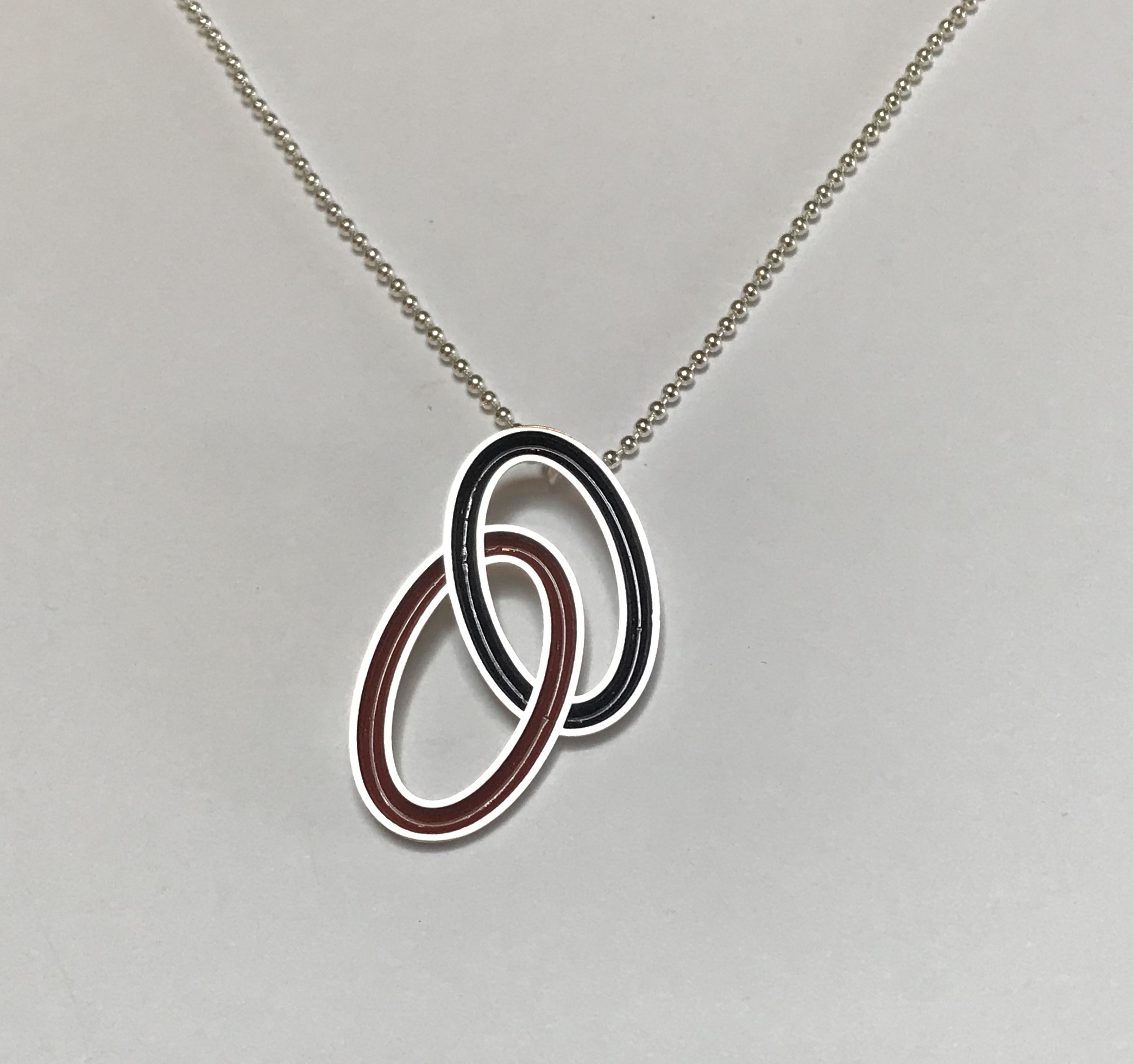 Pendant, Sterling silver with resin.