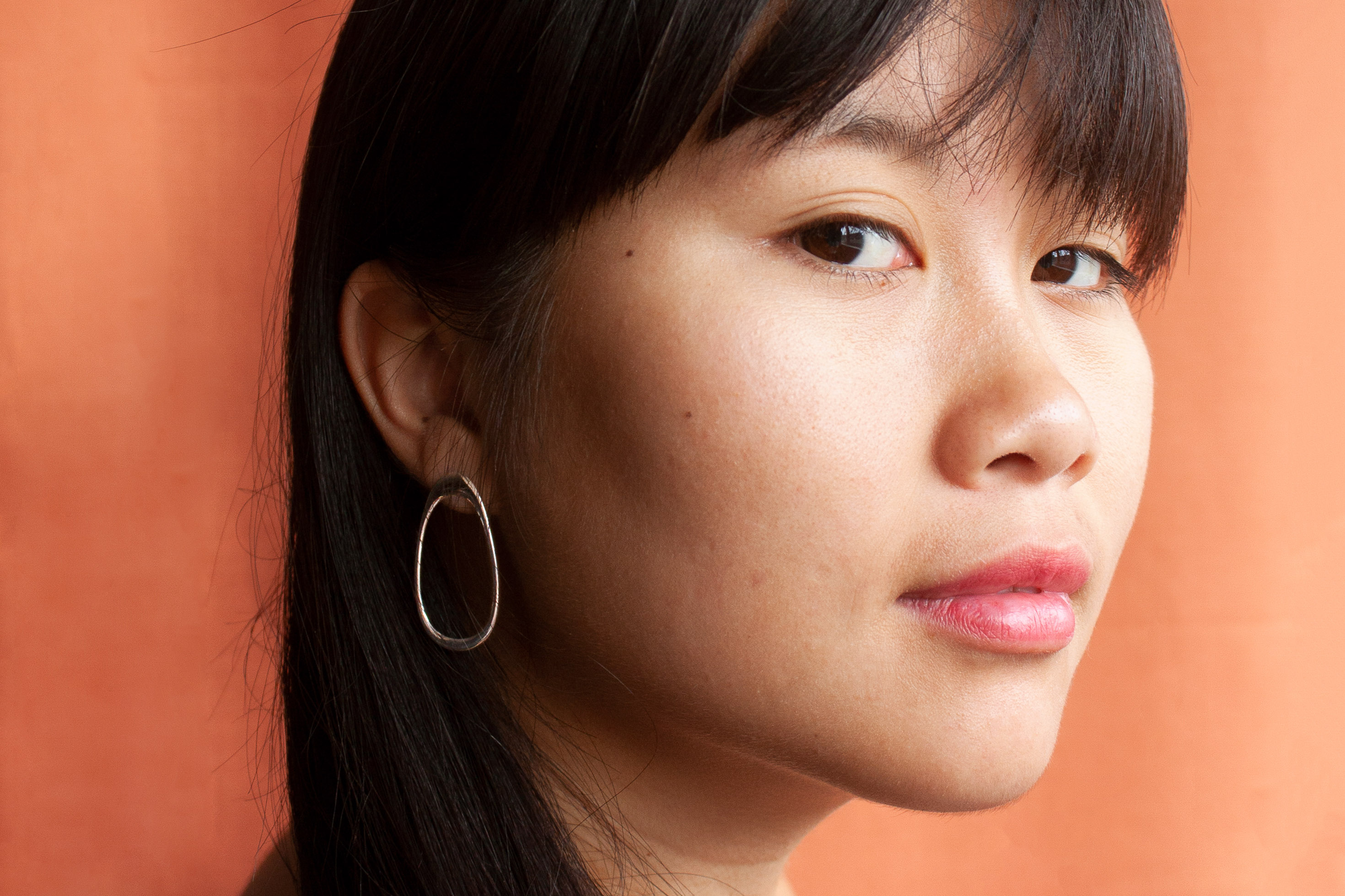 Luth: dawn syphony captured in silver earring