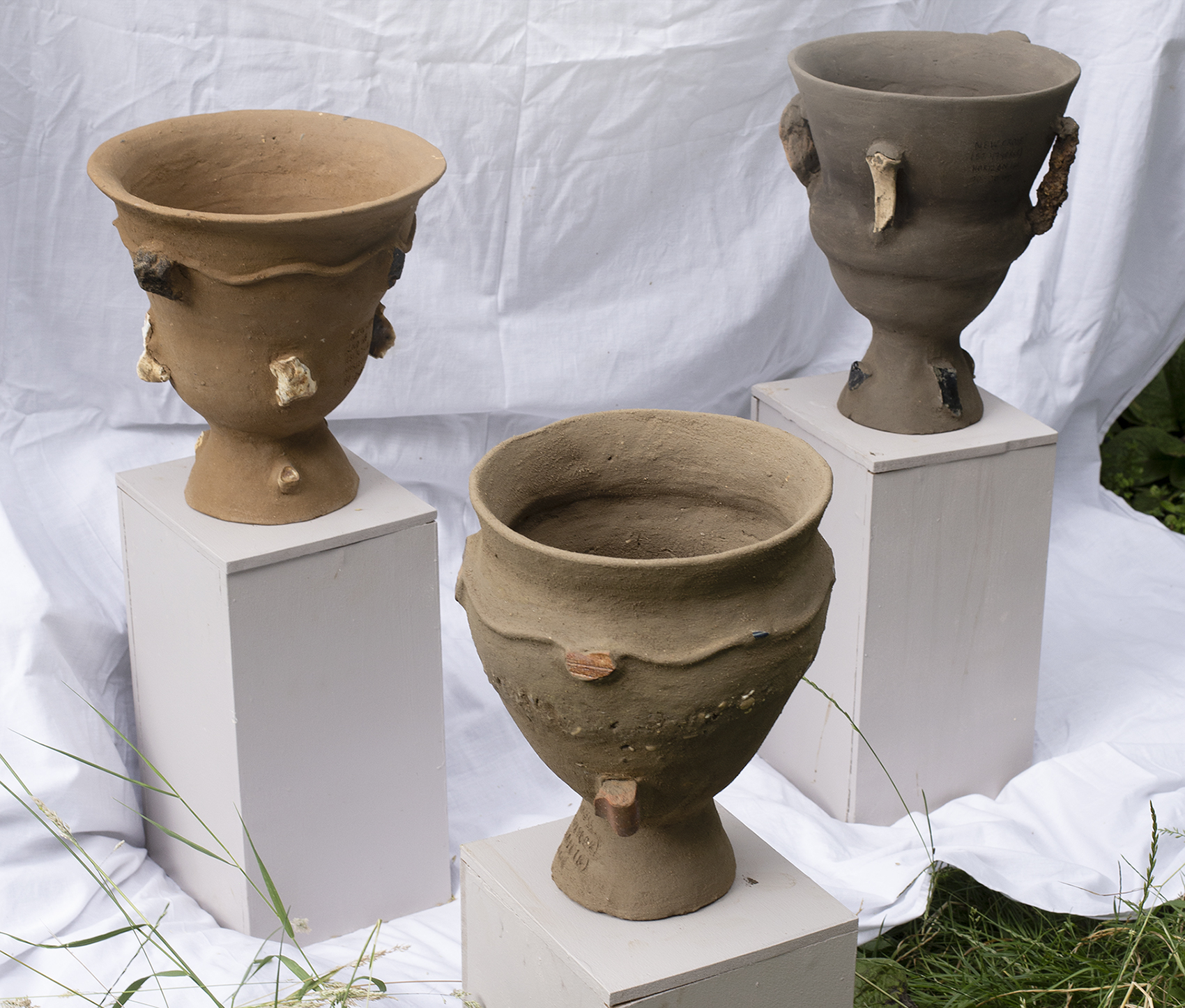 Unfired ceramic vases