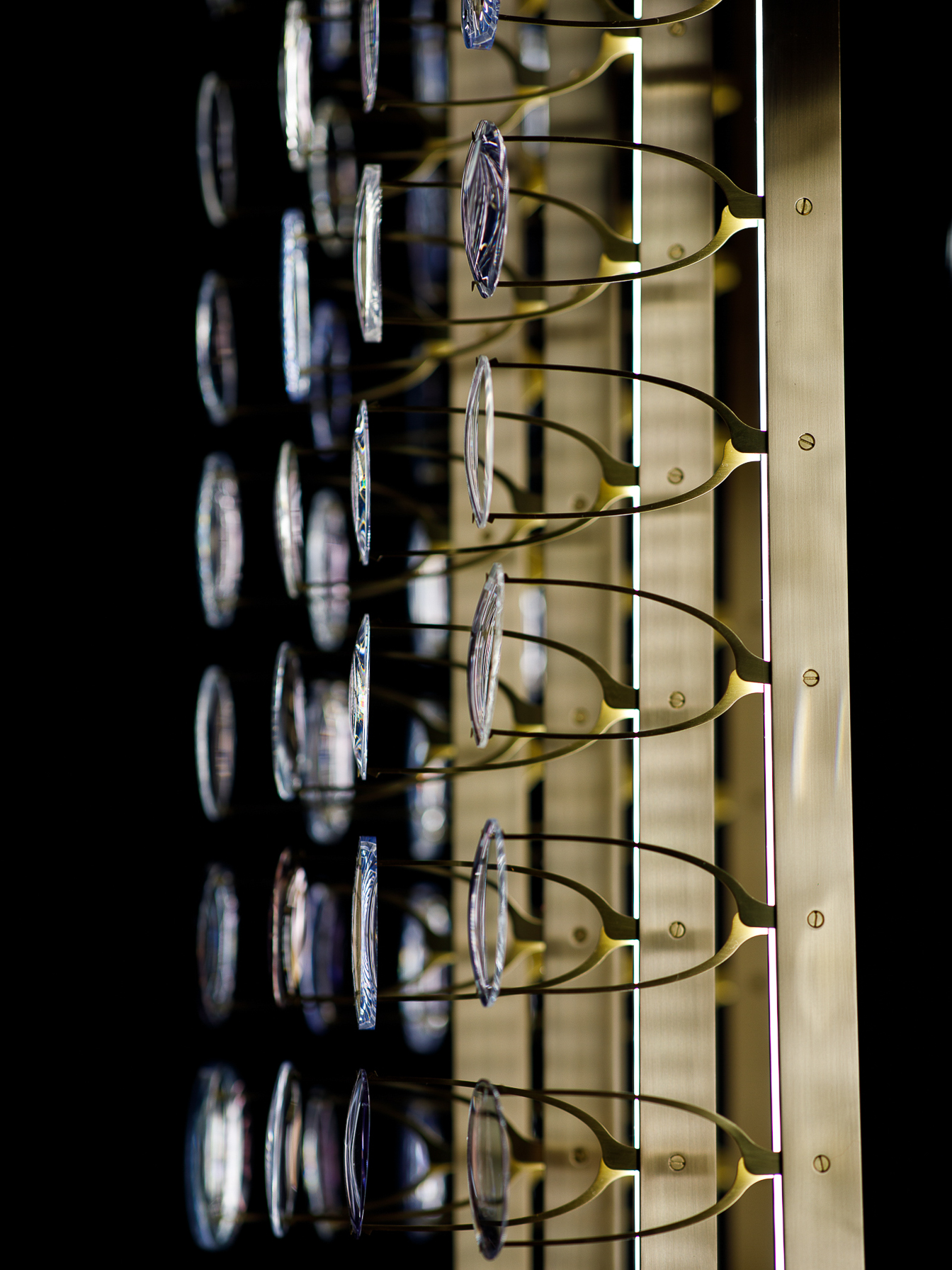 Brass detailing inspired by luxury optics.