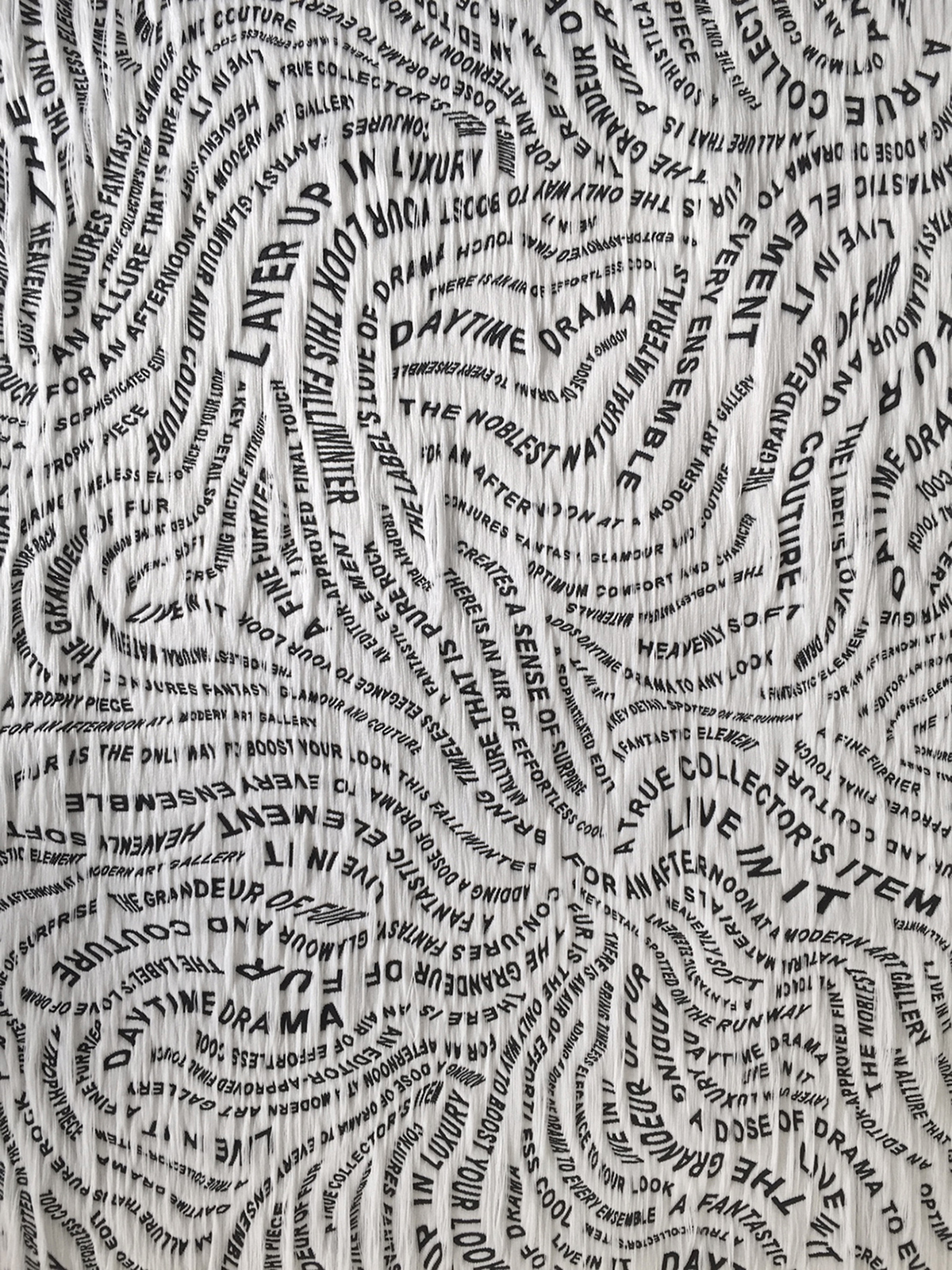 Textile with texts about fur from fashion webshops