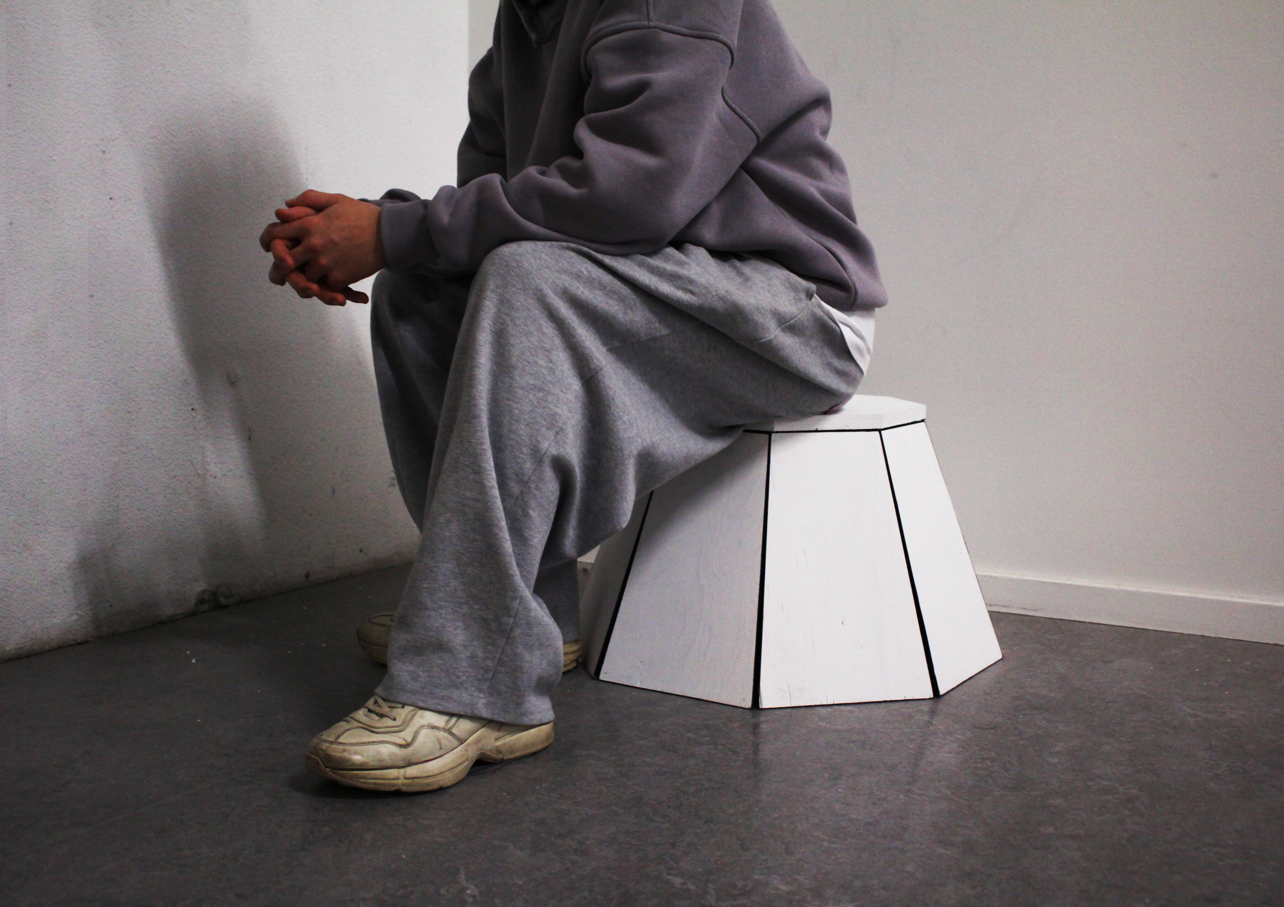 Sitting on the stool