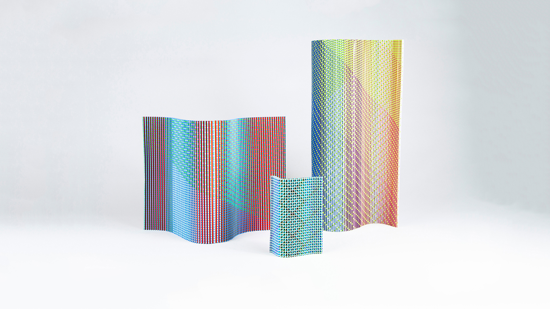 Pleated scale models charged with vibrant color