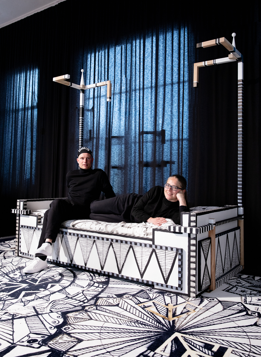 siblings Erna and Victor on their canopy bed