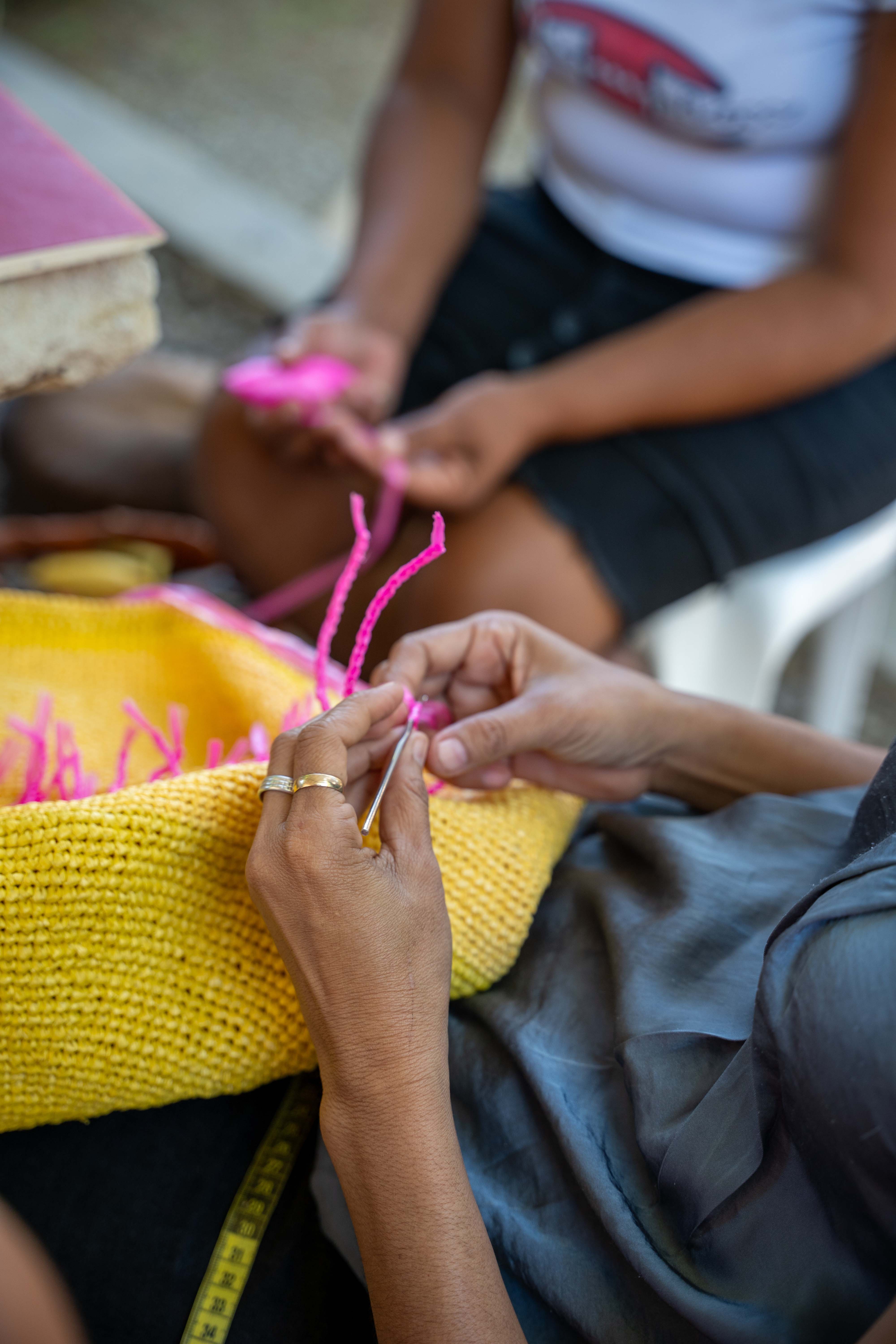 Nicaraguan craftswomen making handmade fabrics.