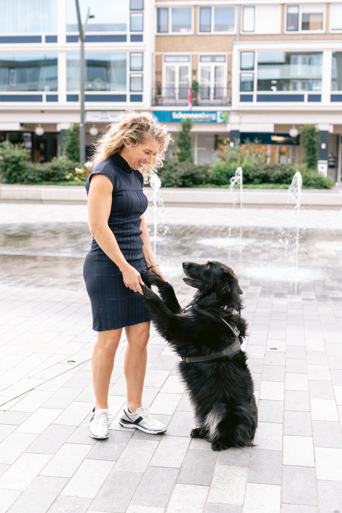 Petra with her blind guide dog wearing SeeFeel