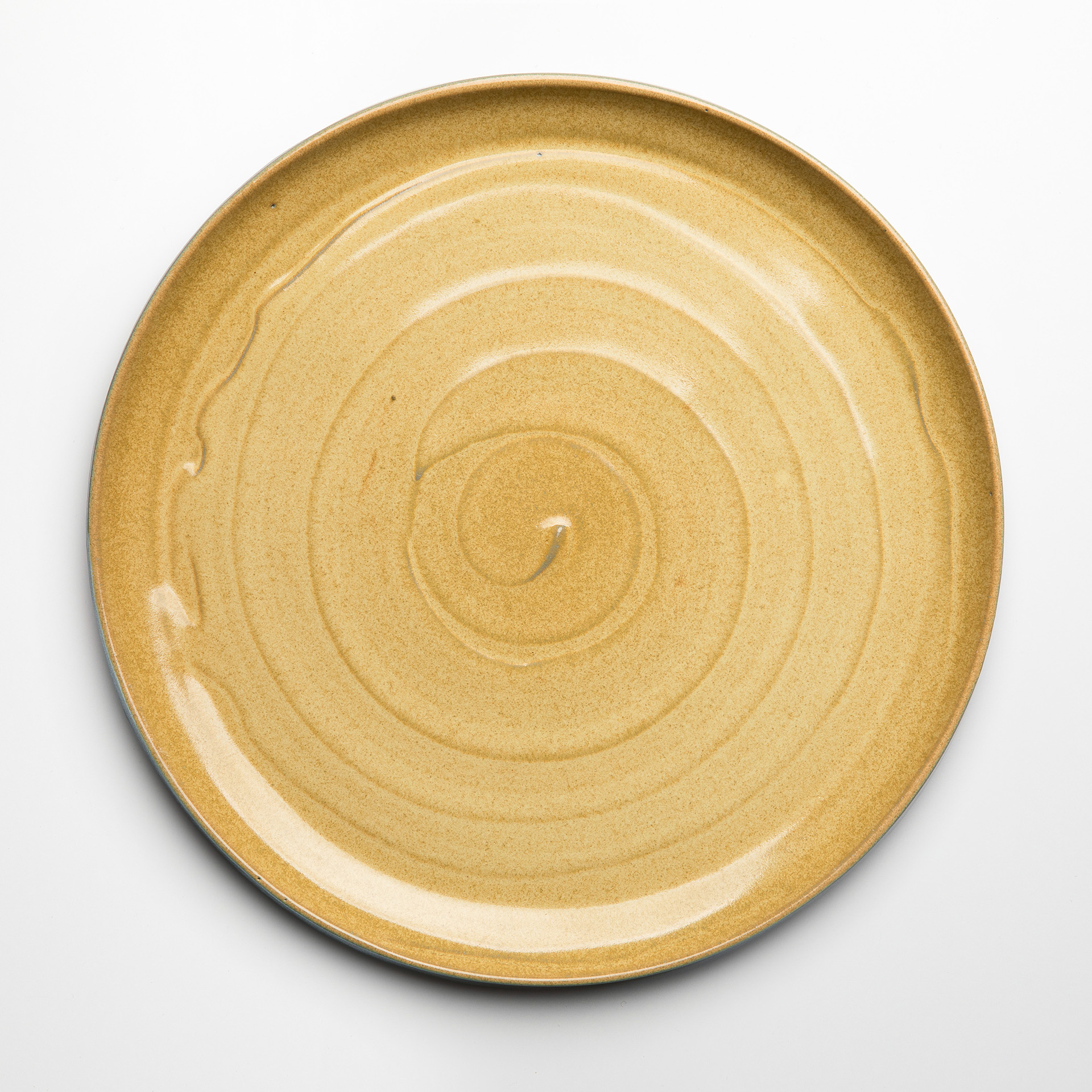 STUCCO dinner plate with yellow glaze