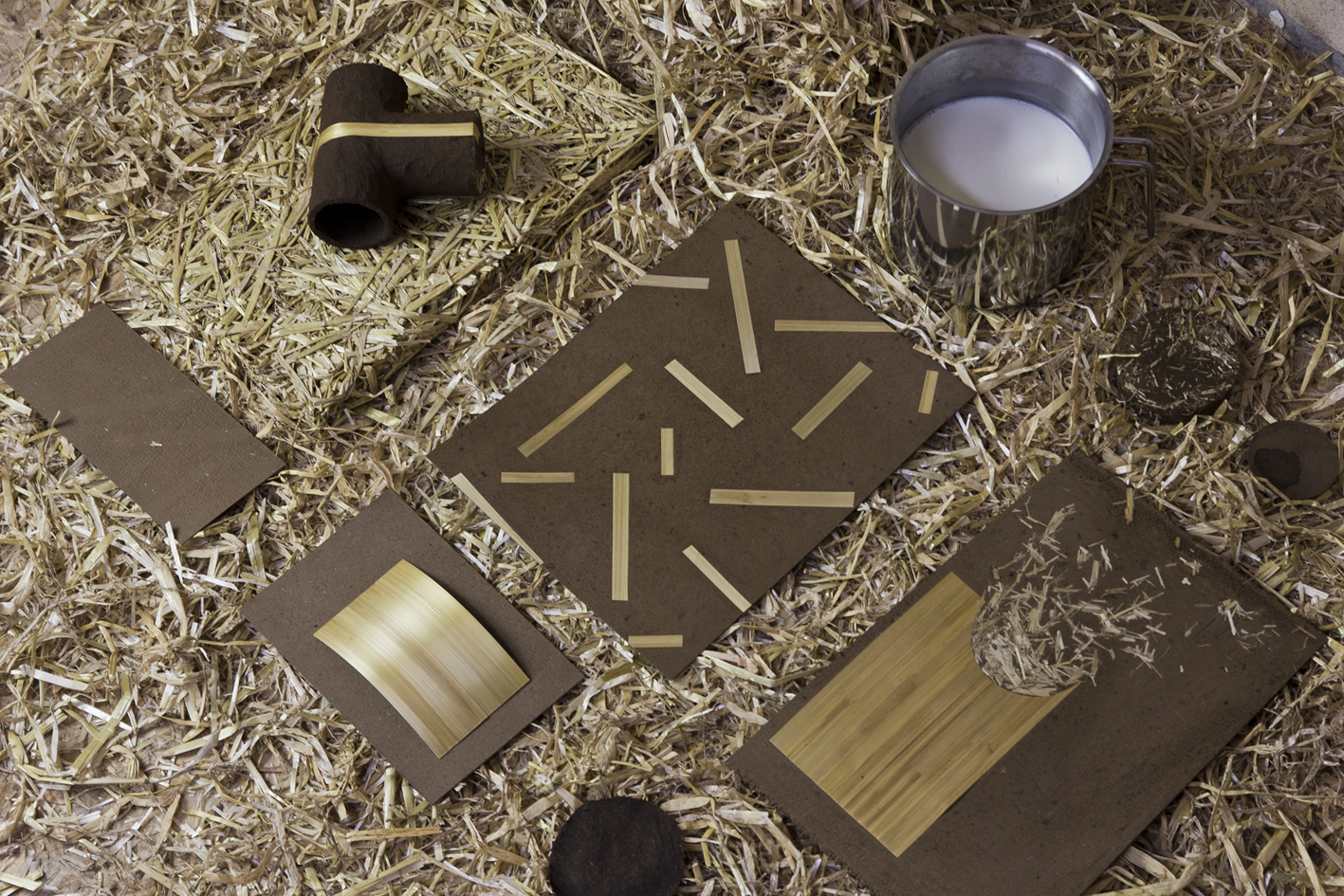 Materials made from milk and wheat by-product.