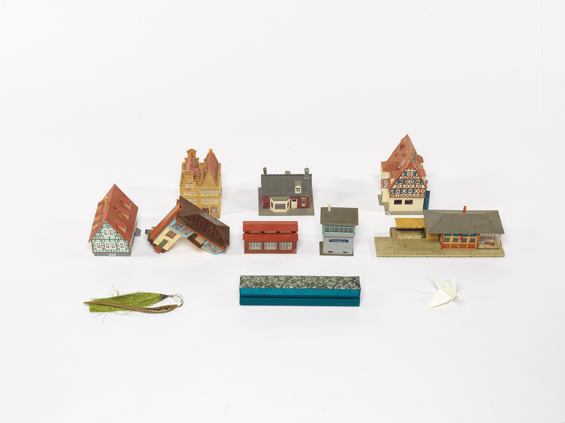 collection of bruised model railroad houses