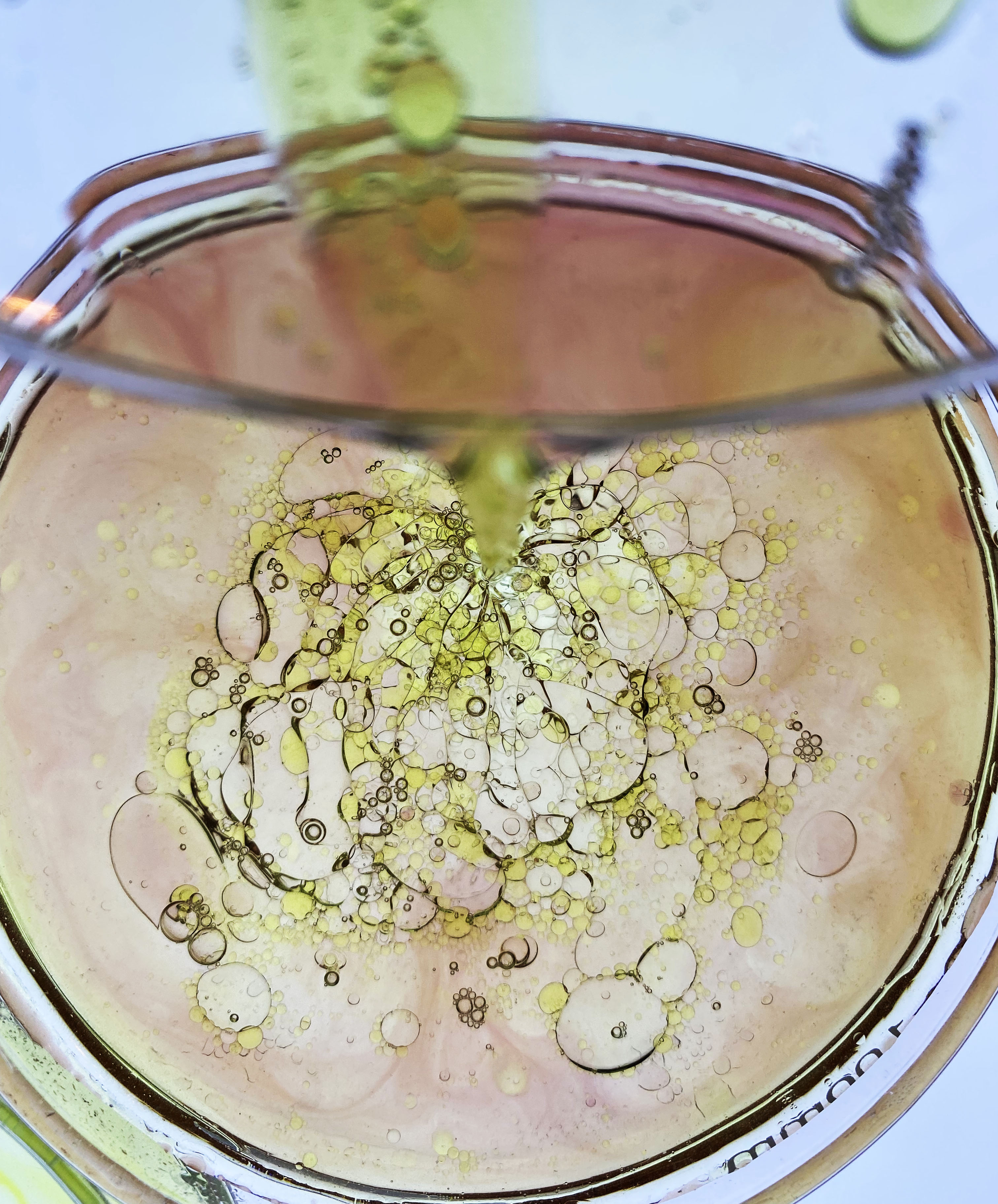 oil, water, soap, food colorant and light