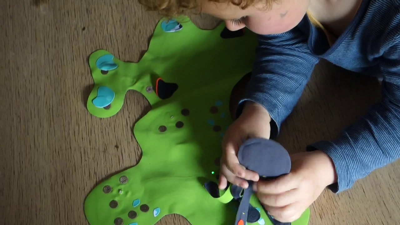 Child playing with Ttorch