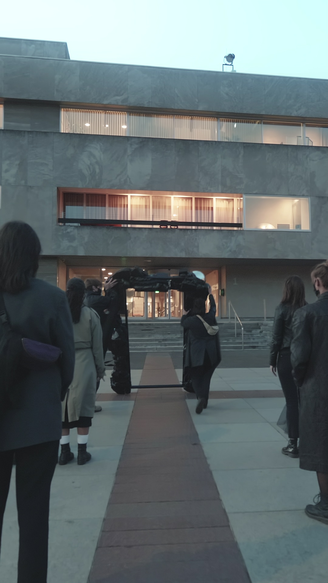 Clubbers facing the town hall of Eindhoven,
