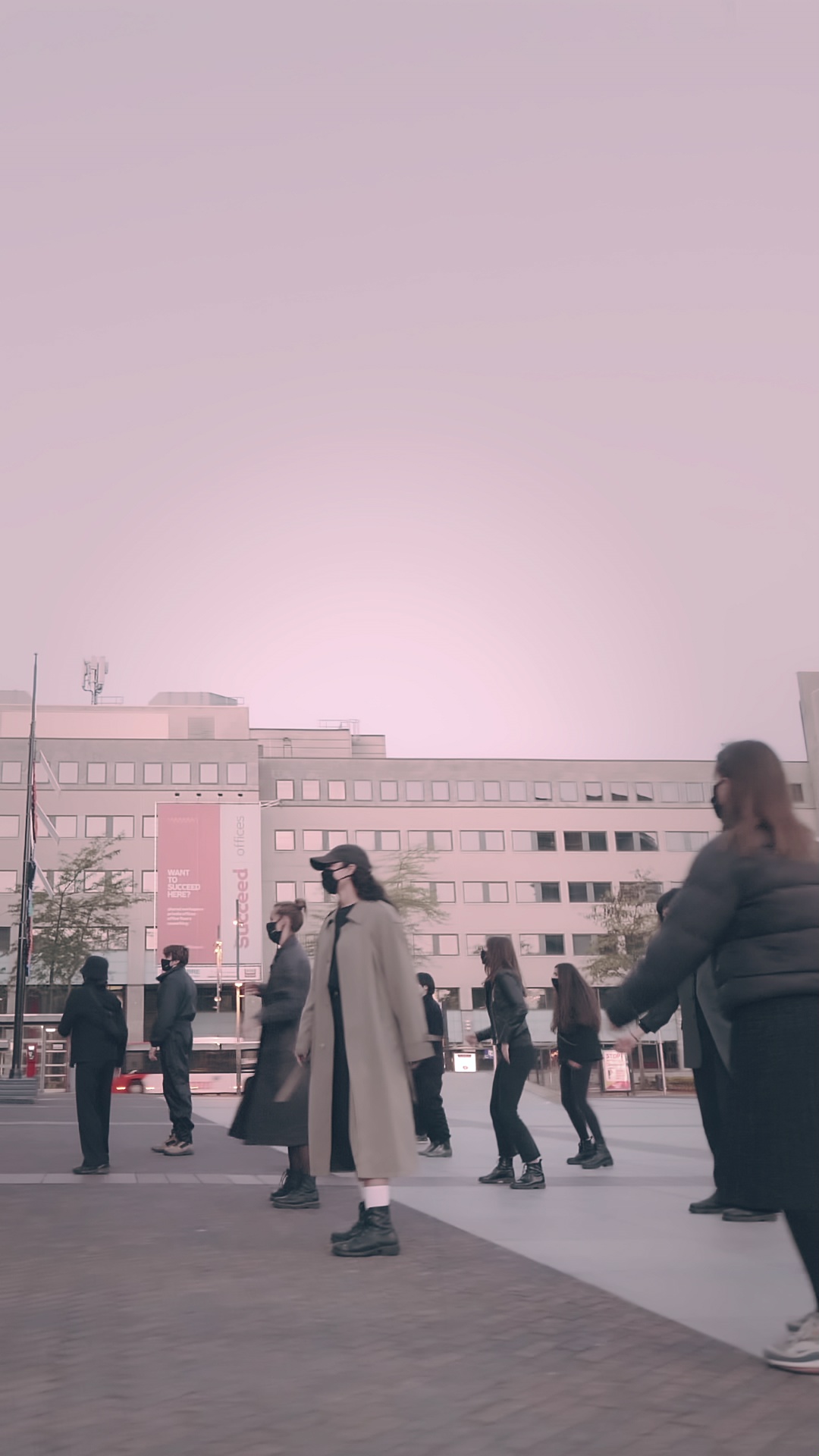Clubbers dancing in front of the town hall